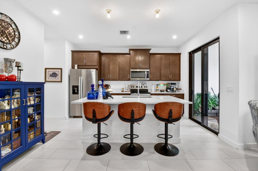 Welcome to 7351 Lenora Lane, a beautifully upgraded home built - photo 4
