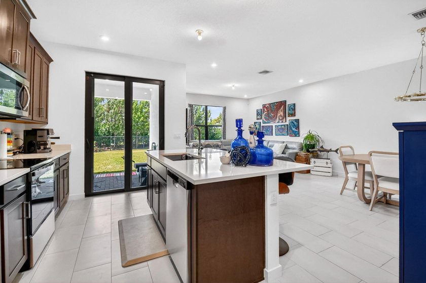 Welcome to 7351 Lenora Lane, a beautifully upgraded home built - photo 8