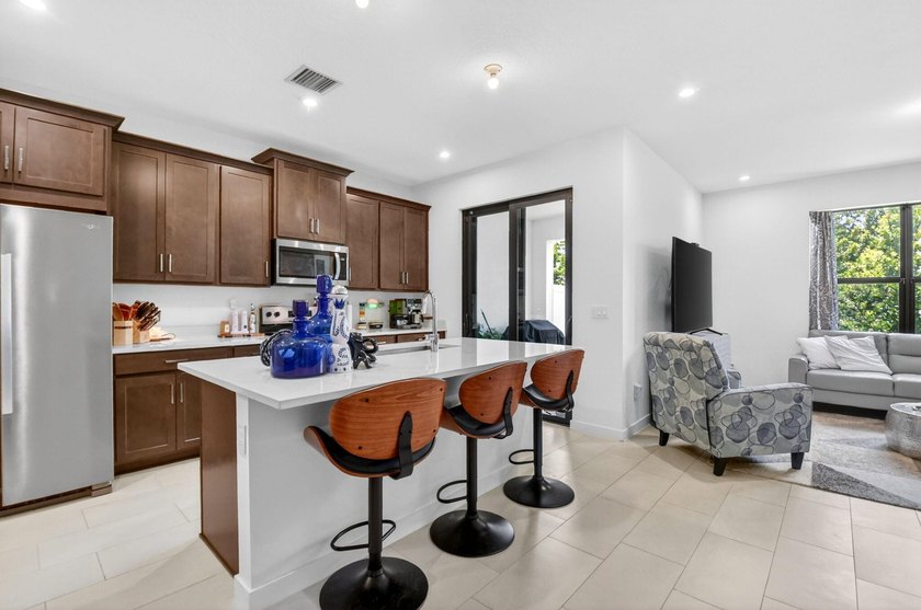 Welcome to 7351 Lenora Lane, a beautifully upgraded home built - photo 9
