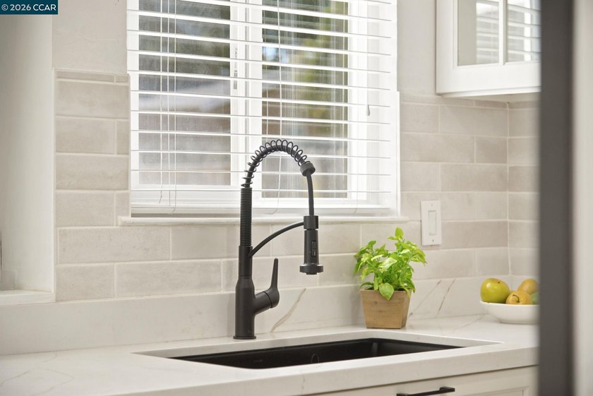 Welcome home to this beautifully updated 3-bedroom, 1.5-bathroom - photo 9