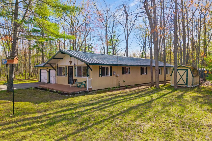 Enjoy northern Michigan living in this well-maintained 3-bedroom - photo 8