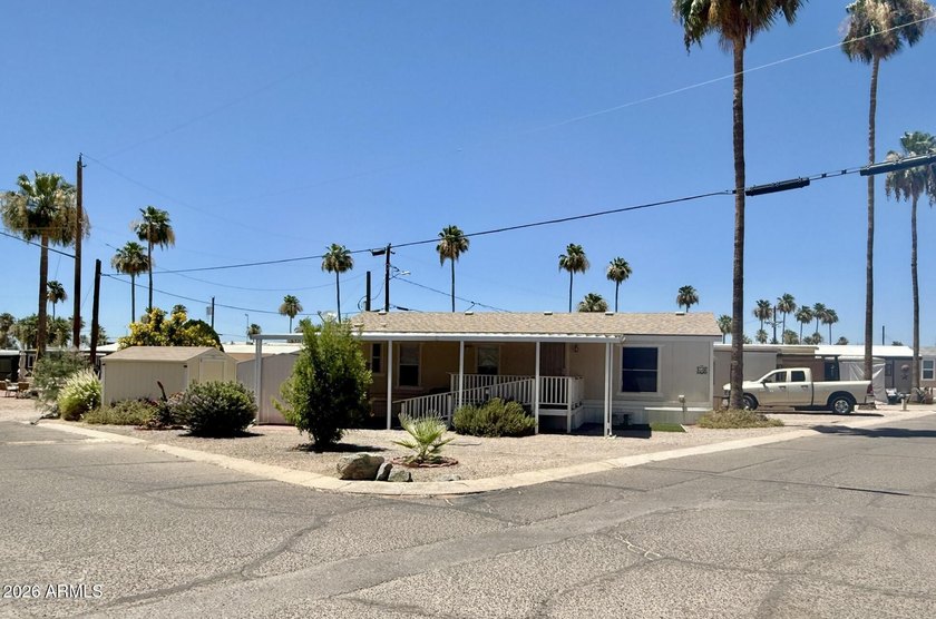 **ALL AGES with LOW lot rent** Welcome Home! Spacious corner-lot - photo 2
