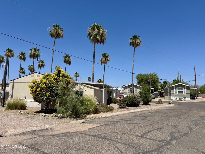 **ALL AGES with LOW lot rent** Welcome Home! Spacious corner-lot - photo 3
