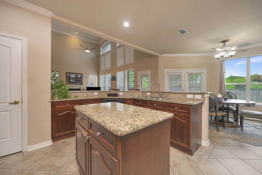 This beautifully maintained home offers a spacious and inviting - photo 3