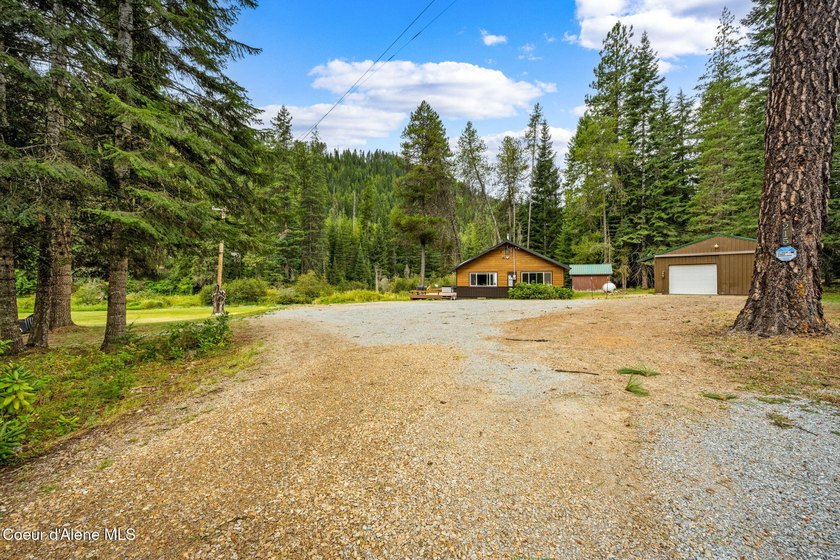 This serene 1.25 acre property on Lamb Creek offers 200 ft. of - photo 11