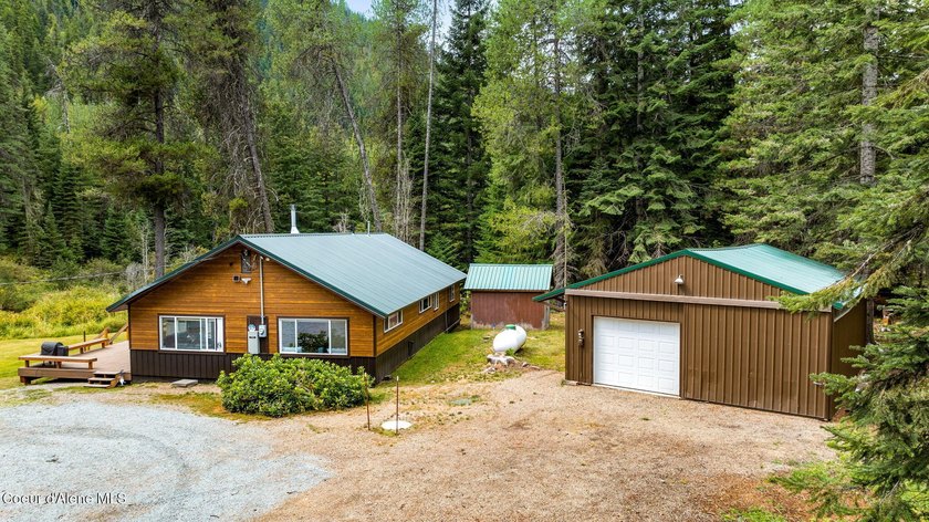 This serene 1.25 acre property on Lamb Creek offers 200 ft. of - photo 12
