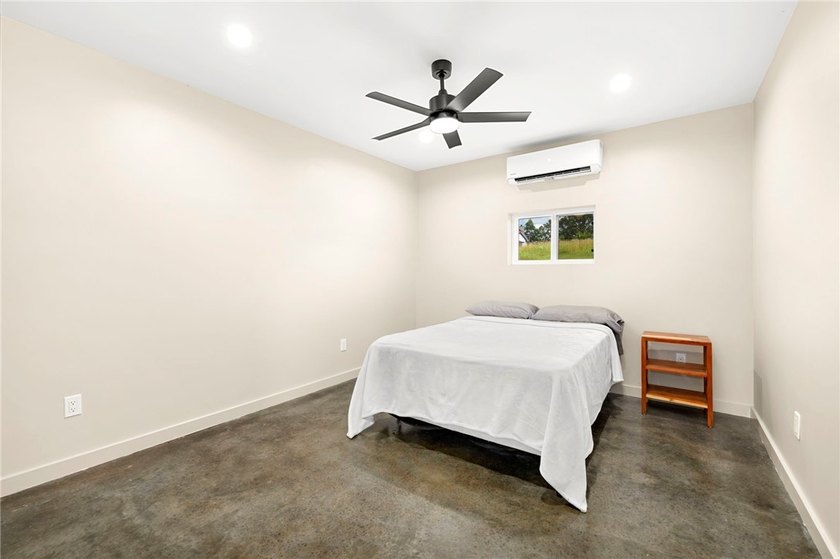Newly constructed in 2024 3-bedroom, 2-bath modern retreat on 6 - photo 13