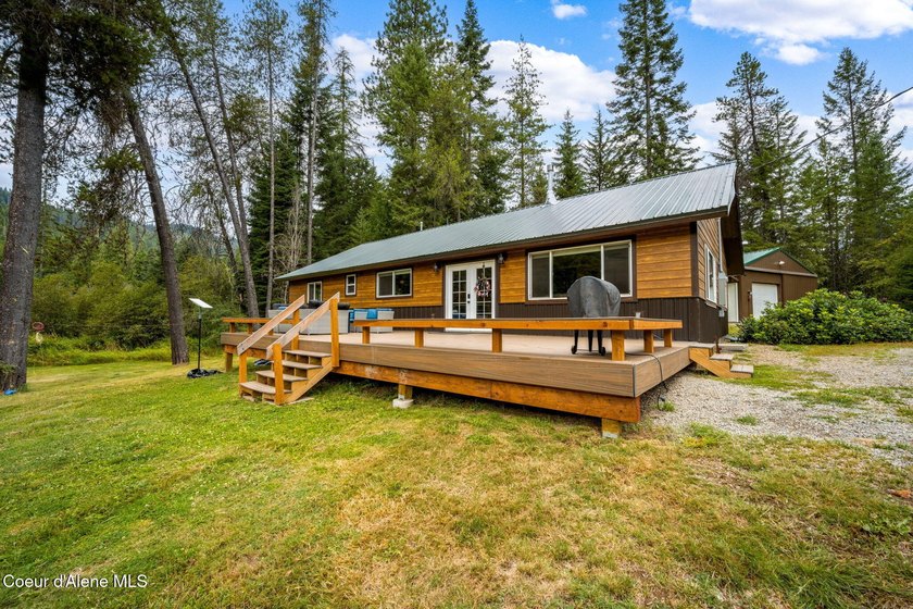 This serene 1.25 acre property on Lamb Creek offers 200 ft. of - photo 14