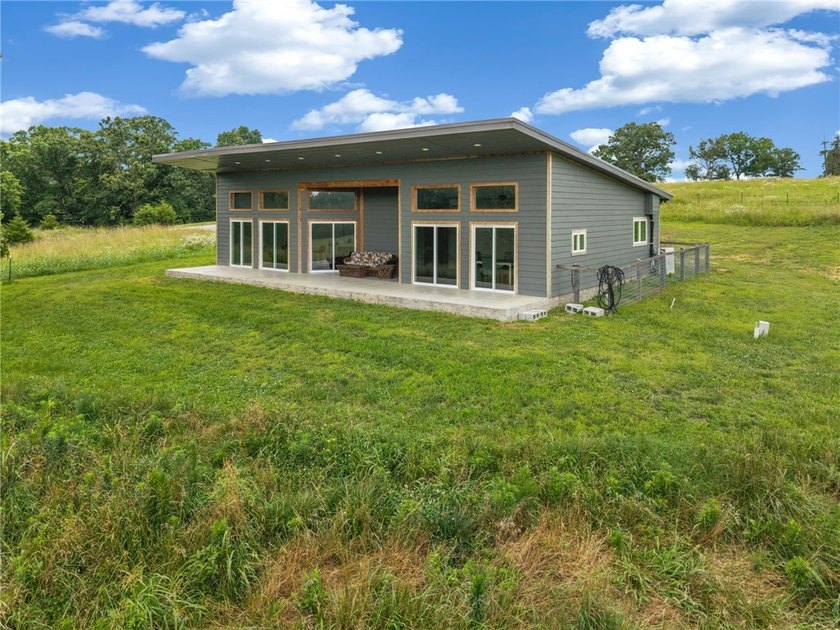 Newly constructed in 2024 3-bedroom, 2-bath modern retreat on 6 - photo 16