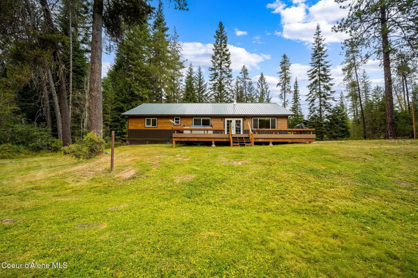 This serene 1.25 acre property on Lamb Creek offers 200 ft. of - photo 17