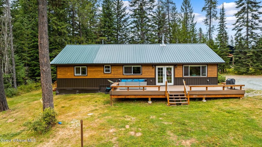 This serene 1.25 acre property on Lamb Creek offers 200 ft. of - photo 18