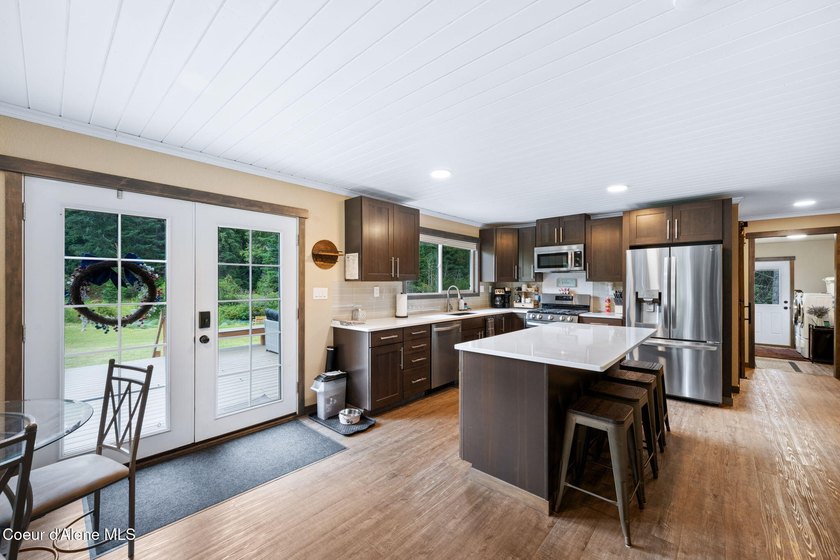 This serene 1.25 acre property on Lamb Creek offers 200 ft. of - photo 20