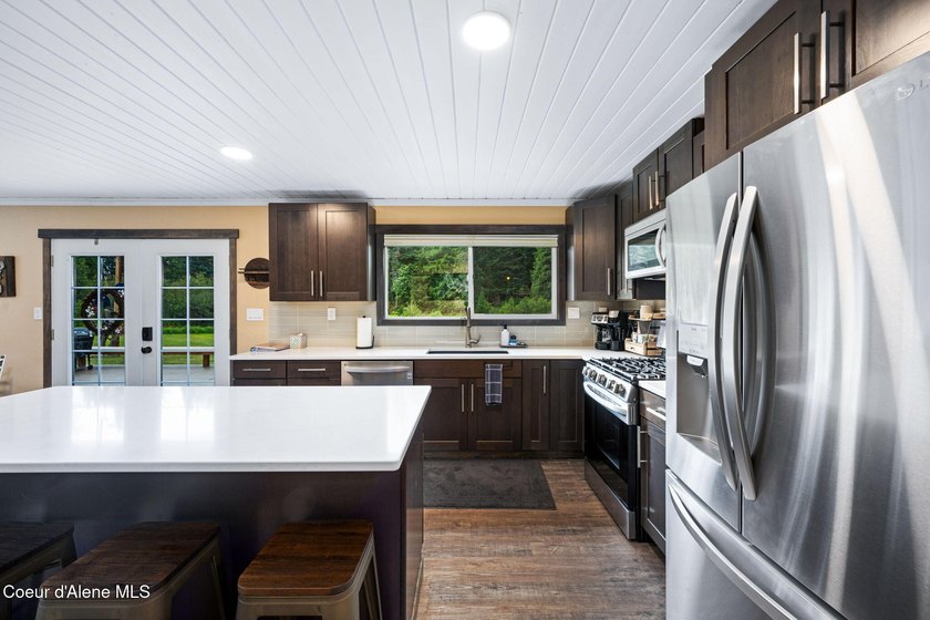 This serene 1.25 acre property on Lamb Creek offers 200 ft. of - photo 23