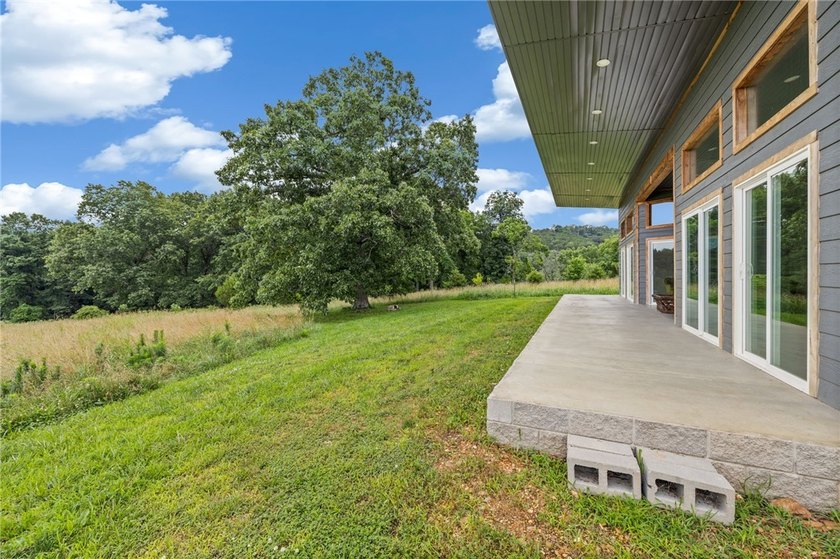 Newly constructed in 2024 3-bedroom, 2-bath modern retreat on 6 - photo 26