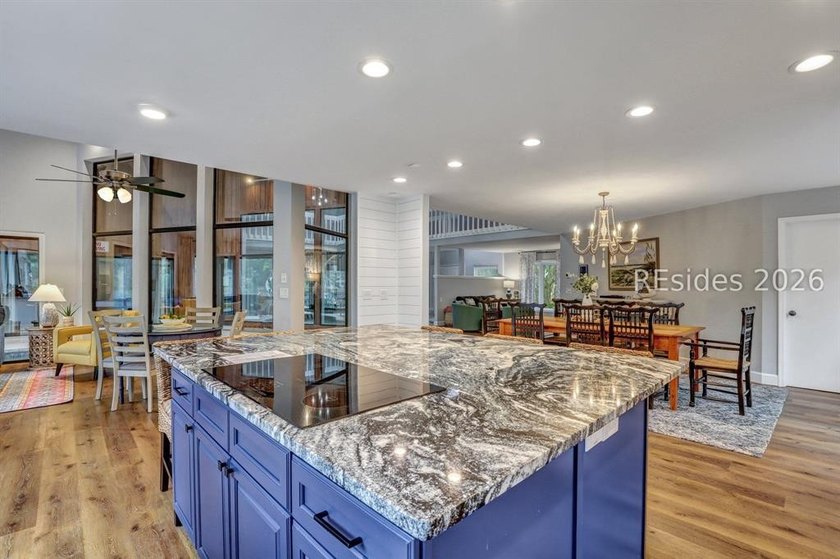 Unique home with a covered, heated pool and bi-fold doors that - photo 26