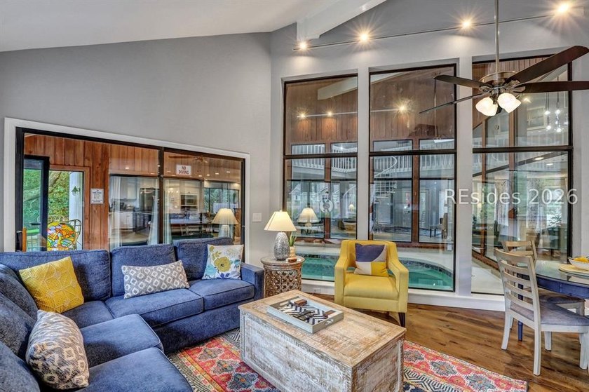 Unique home with a covered, heated pool and bi-fold doors that - photo 32