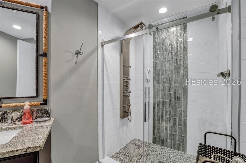 Unique home with a covered, heated pool and bi-fold doors that - photo 40