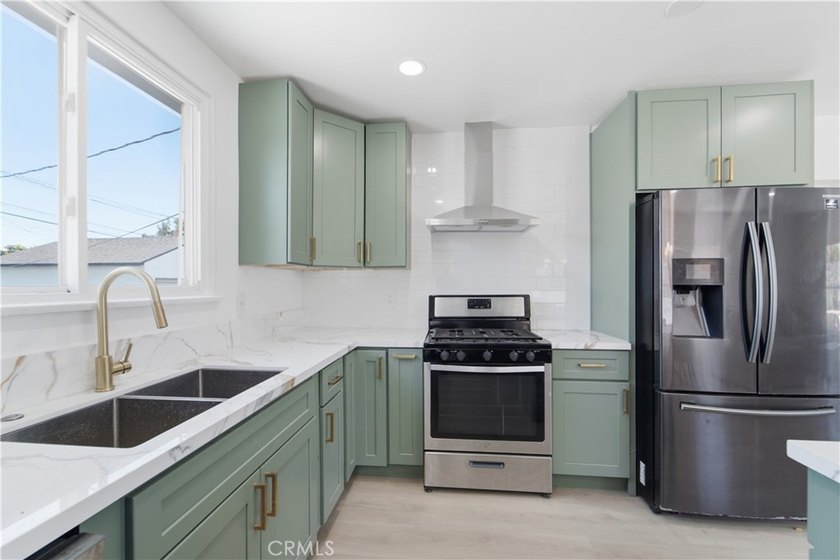 Welcome to sunny torrance. This home is a renovated modern 3 - photo 4
