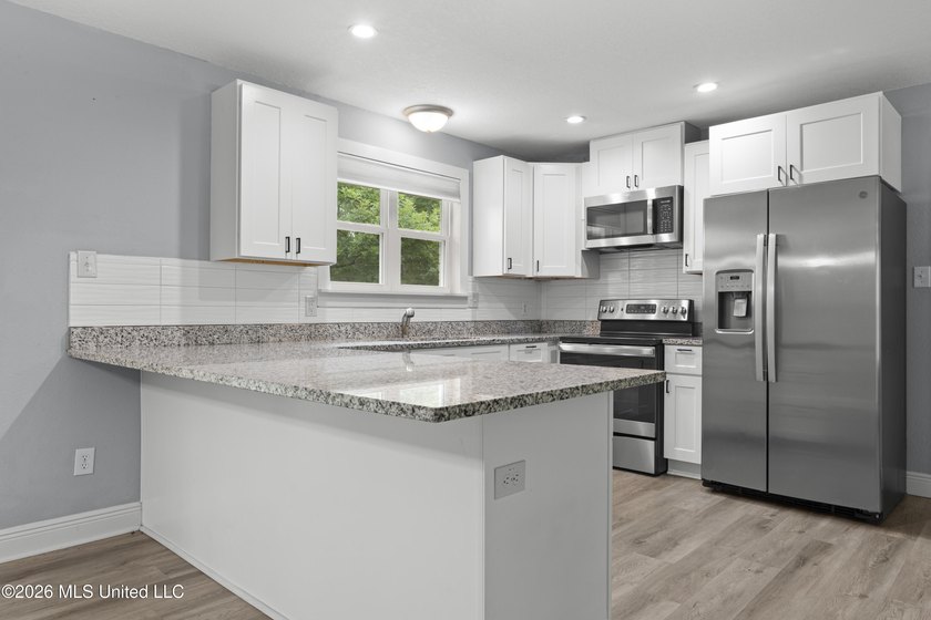 If you've been waiting for an updated, move-in ready home with - photo 9