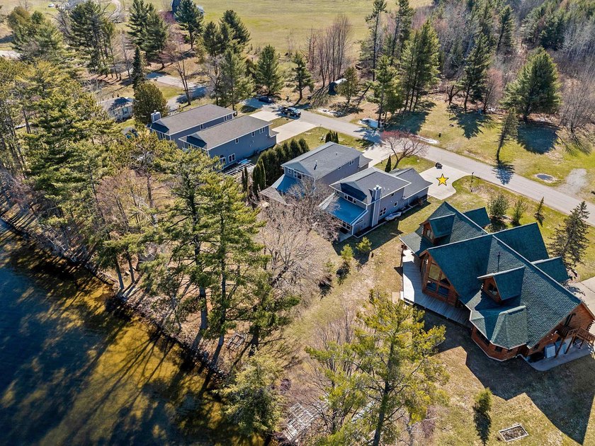 Condo MLS #50324036. Level lot with sandy frontage on popular - photo 30