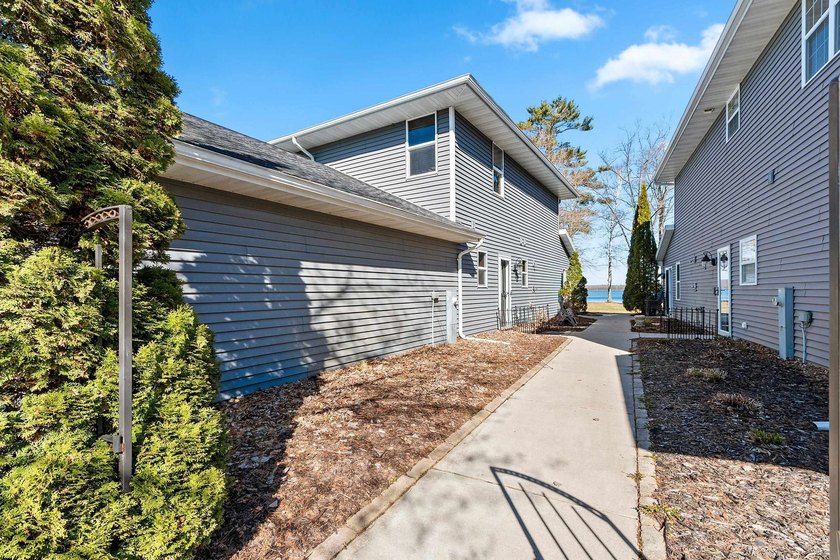 Condo MLS #50324036. Level lot with sandy frontage on popular - photo 35
