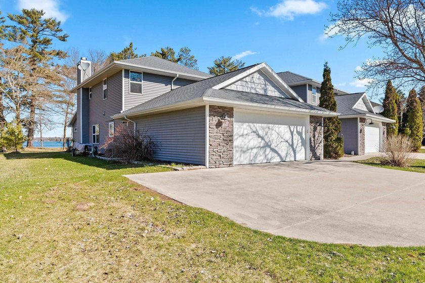 Condo MLS #50324036. Level lot with sandy frontage on popular - photo 36