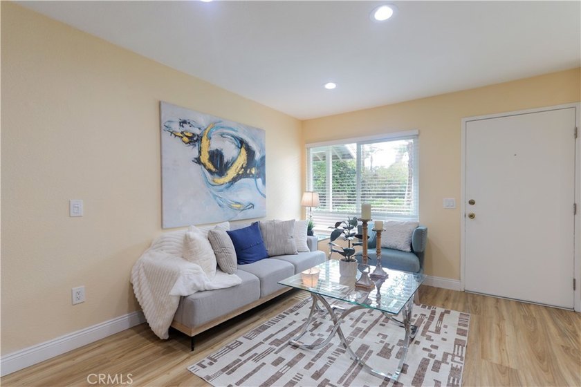 Beautifully Updated 3-Bedroom, 2-Bath Townhouse with an Attached - photo 2