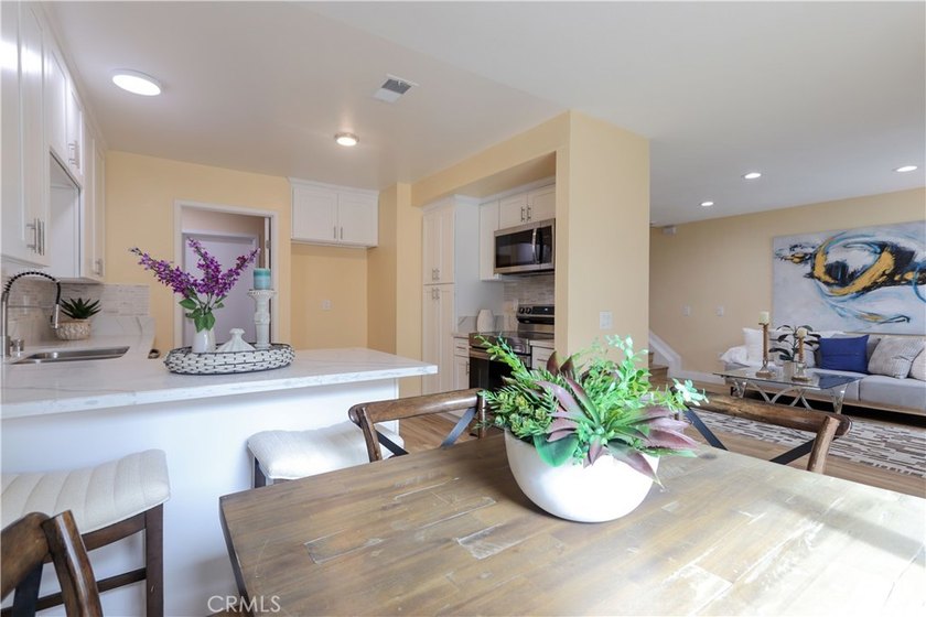 Beautifully Updated 3-Bedroom, 2-Bath Townhouse with an Attached - photo 5
