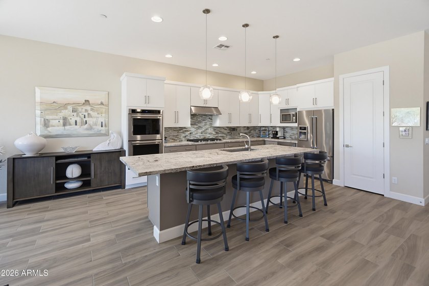 Experience Arizona luxury living in the prestigious gated - photo 13