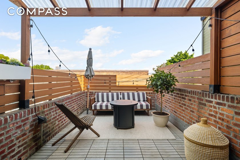 This meticulously renovated townhouse at 17-05 Willoughby Avenue - photo 3