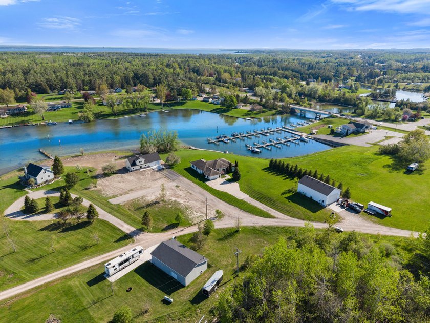 Brand new construction on the beautiful Cheboygan River! Enjoy - photo 5