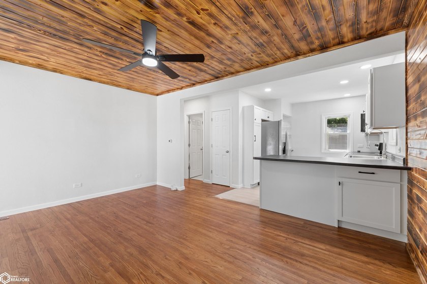 Beautifully remodeled and move-in ready, this charming home - photo 6