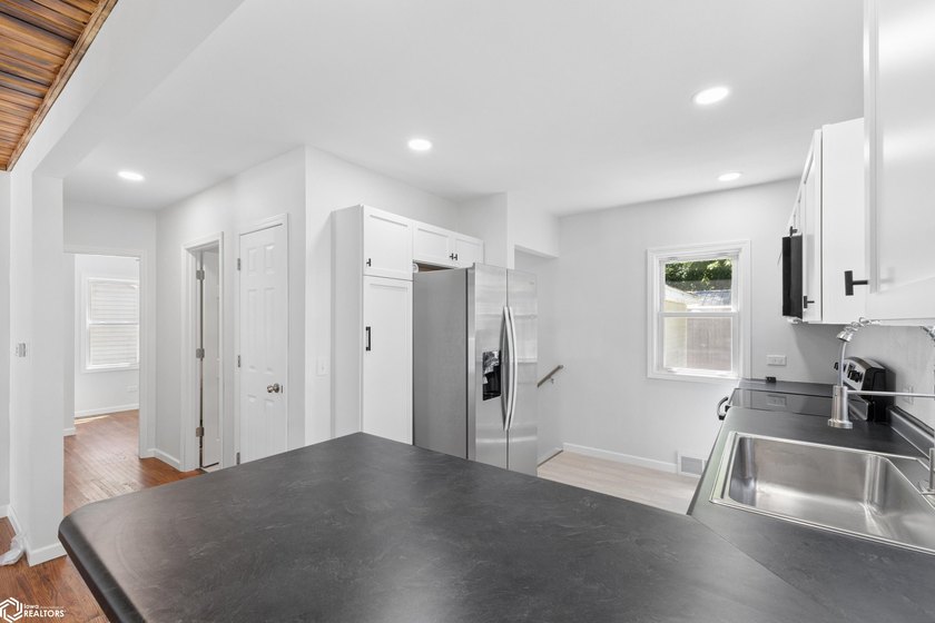Beautifully remodeled and move-in ready, this charming home - photo 8