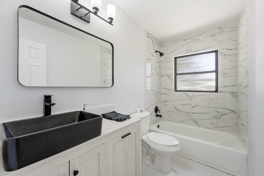 Fully remodeled and move-in ready! This 2-bedroom, 2-bathroom - photo 10