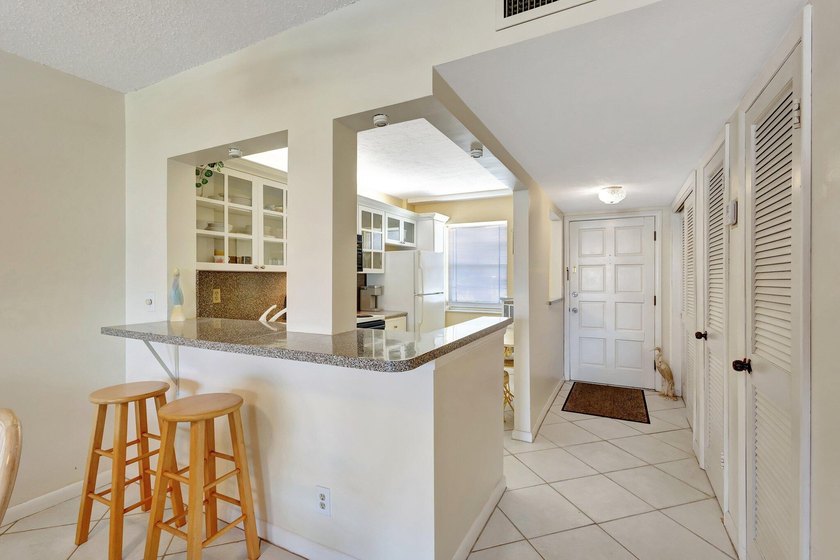 VIEWS! VIEWS! VIEWS! NPB Condo with low HOA fees! Beautiful - photo 5