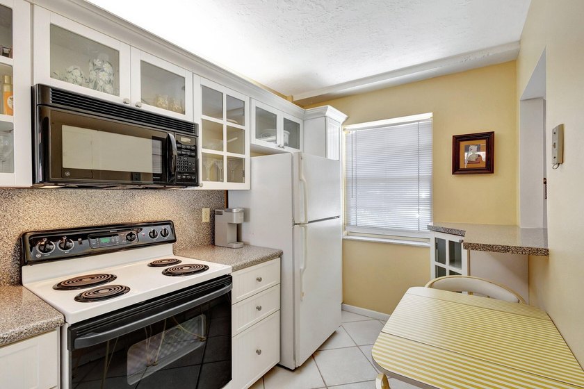 VIEWS! VIEWS! VIEWS! NPB Condo with low HOA fees! Beautiful - photo 6