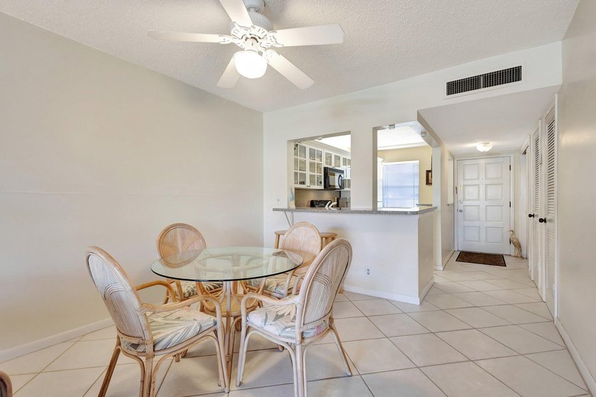 VIEWS! VIEWS! VIEWS! NPB Condo with low HOA fees! Beautiful - photo 9