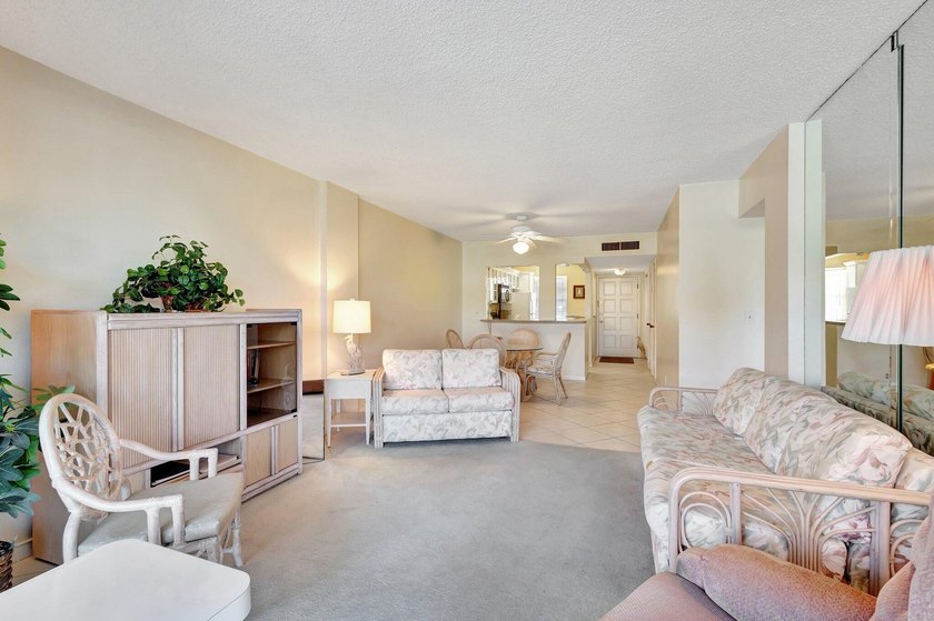 VIEWS! VIEWS! VIEWS! NPB Condo with low HOA fees! Beautiful - photo 10