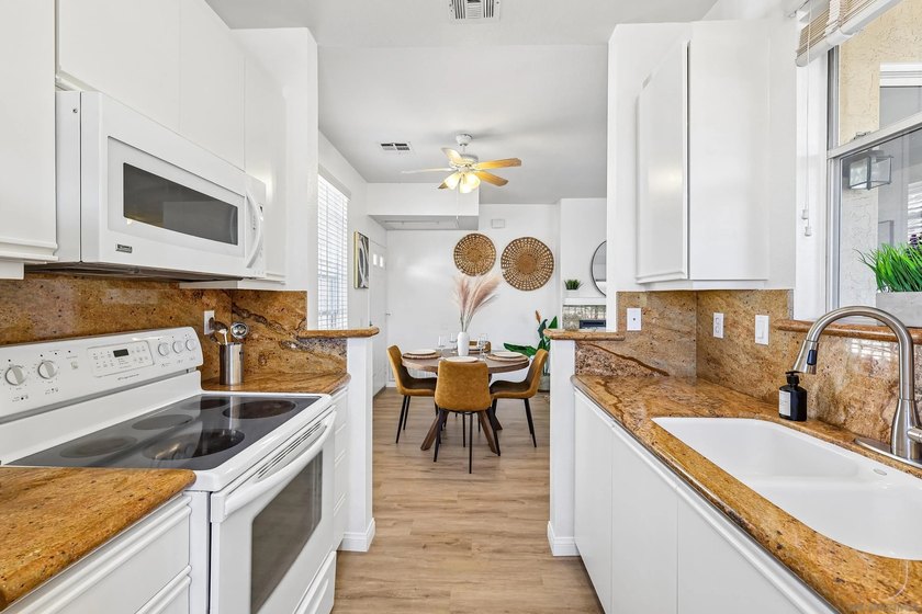 Motivated Seller!! This light and bright top floor condo is - photo 15