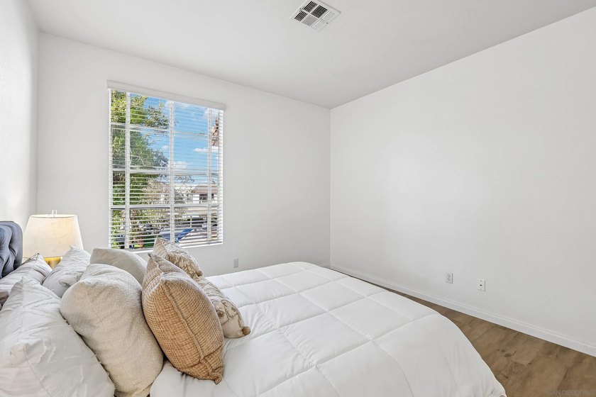Motivated Seller!! This light and bright top floor condo is - photo 22