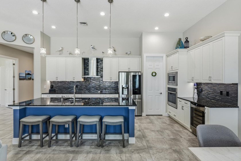 Stunning 3 bedroom home in PGA Verano. Featuring a 15x30 premium - photo 11