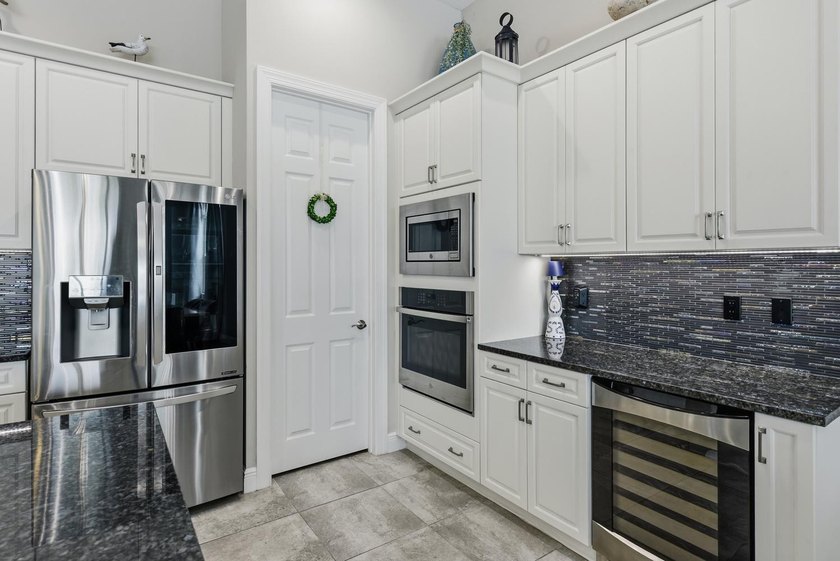 Stunning 3 bedroom home in PGA Verano. Featuring a 15x30 premium - photo 12