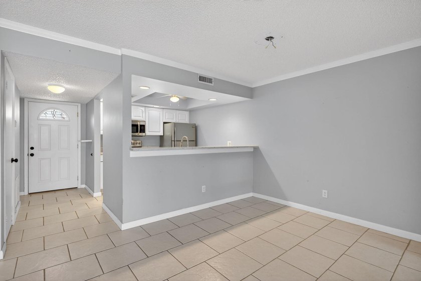 Beautiful first-floor corner unit in the resort-style community - photo 11