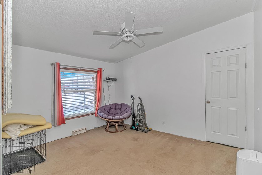 Welcome to 6043 East West Way, an inviting coastal home nestled - photo 17