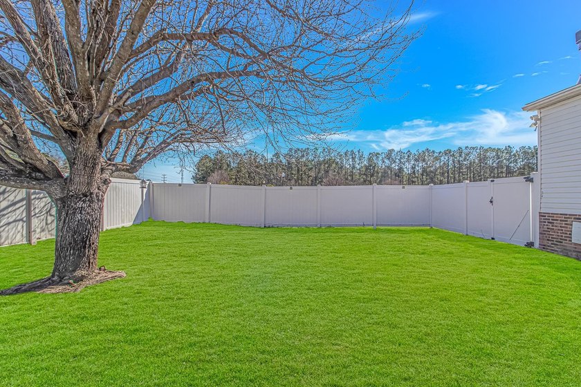 Welcome to 6043 East West Way, an inviting coastal home nestled - photo 25