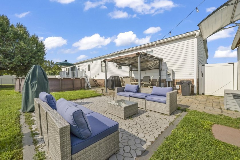 Welcome to 6043 East West Way, an inviting coastal home nestled - photo 31
