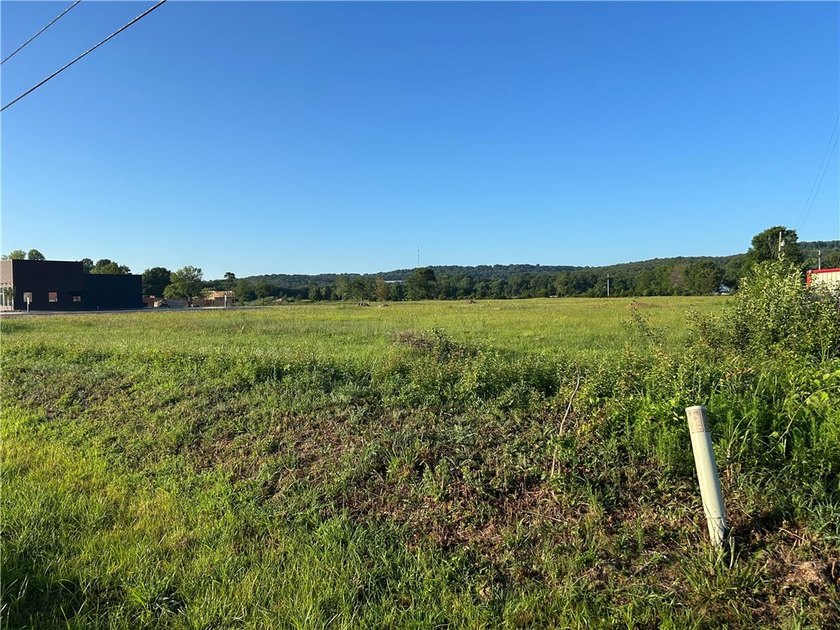 2.69 flat acres with 248' of frontage on Highway 16. The - photo 4