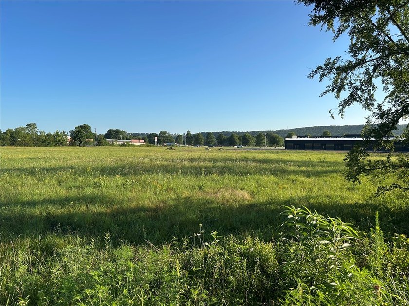 2.69 flat acres with 248' of frontage on Highway 16. The - photo 5