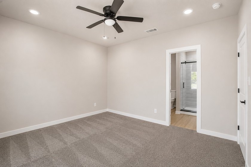 Step into elevated living in this stunning newly built residence - photo 12