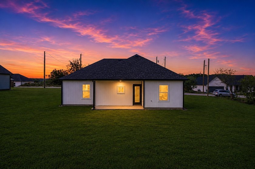 Step into elevated living in this stunning newly built residence - photo 25